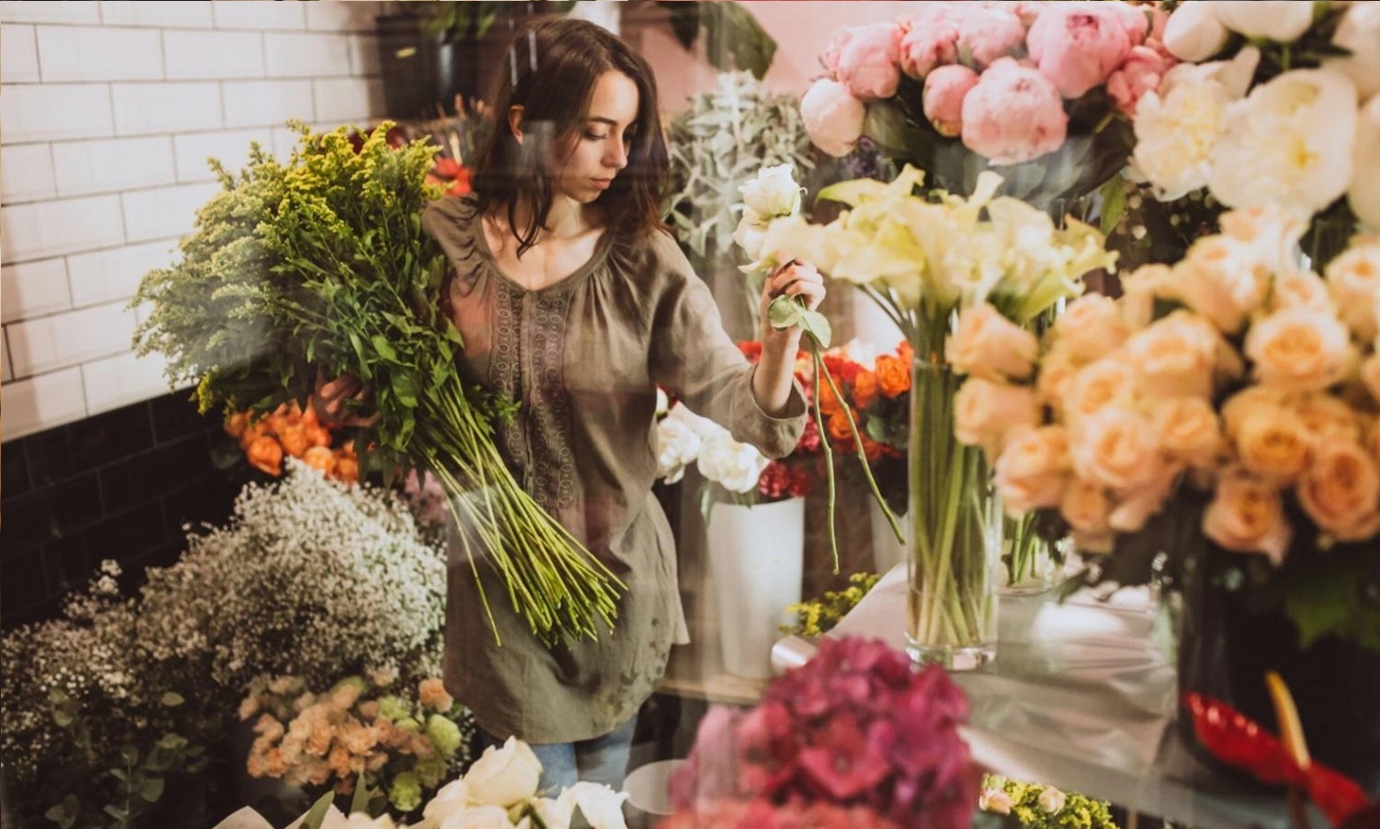 Instructor examining historical floral materials